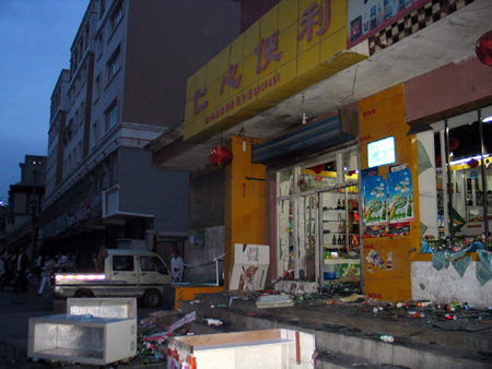 A shop smashed on Tianchi Street in Urumqi